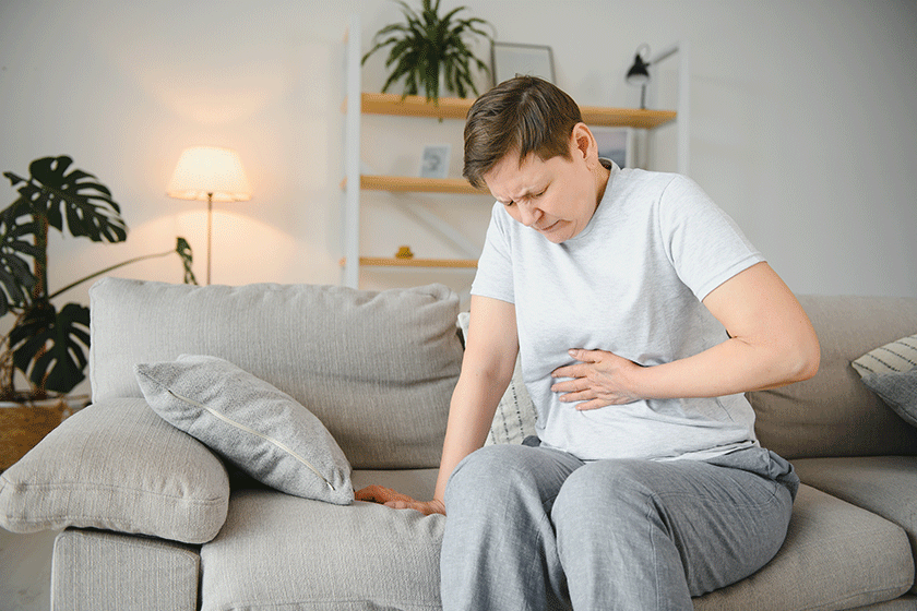 sick upset middle aged lady hold belly suffer abdomen ache sick upset middle aged lady hold belly suffer abdomen ache