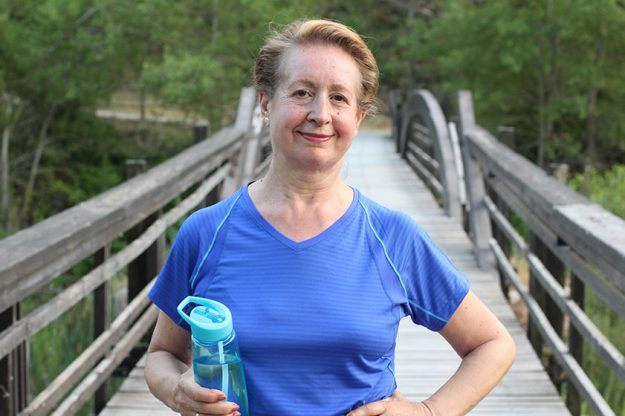 Senior Natural Woman Relaxing After Exercise Senior Natural Woman Relaxing After Exercise