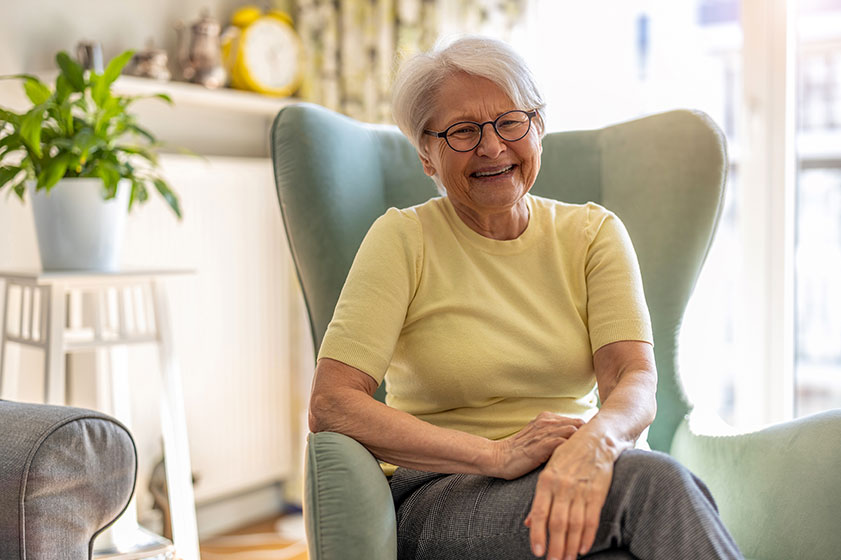 Portrait smiling senior woman home Portrait smiling senior woman home