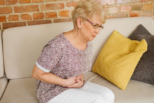 Senior woman having stomachache Senior woman having stomachache