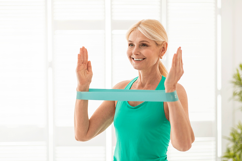 smiling senior lady exercising