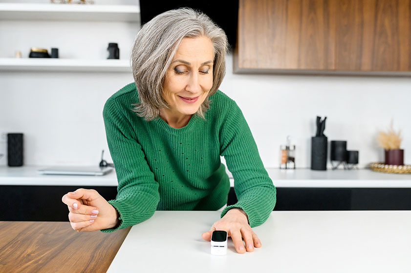 woman using oximeter for measures the oxygen saturation woman using oximeter for measures the oxygen saturation