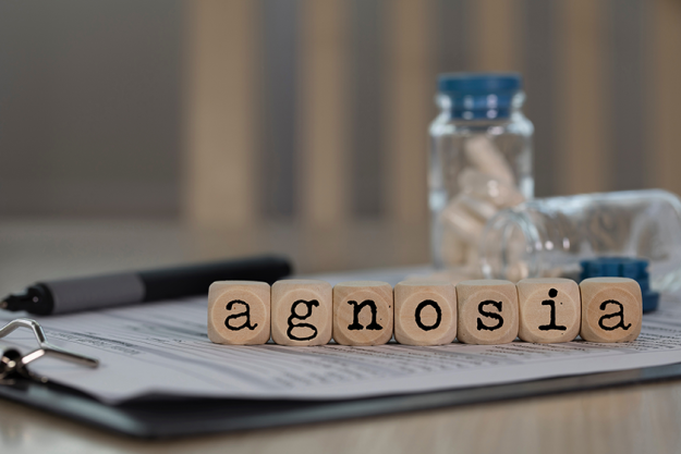 word agnosia composed of wooden dices