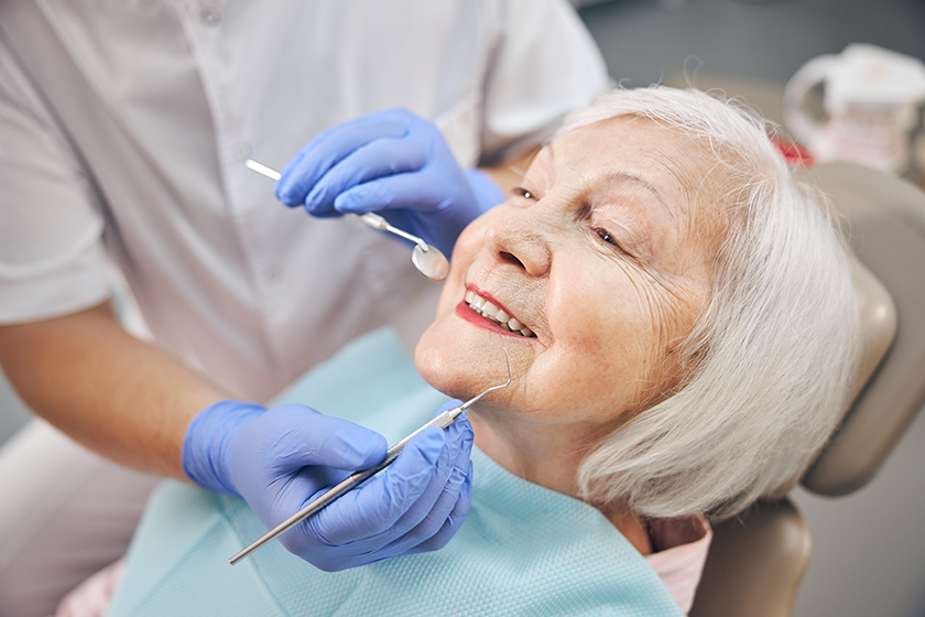 doctor is holding dental tools doctor is holding dental tools