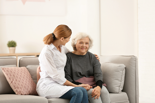 elderly woman female caregiver
