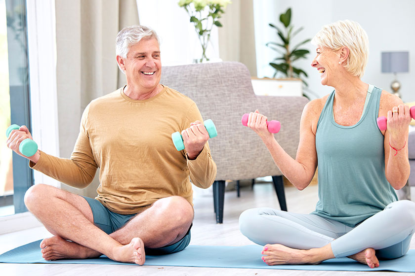 fitness senior couple dumbbell exercise wellness muscle training mat happiness