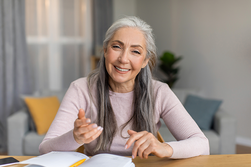 glad smiling european mature female teacher glad smiling european mature female teacher