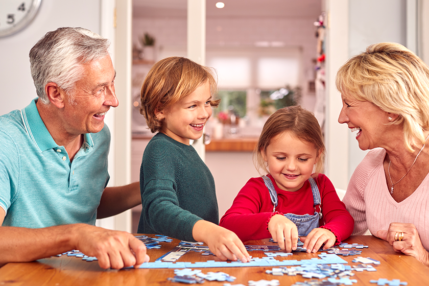 grandchildren grandparents sit table