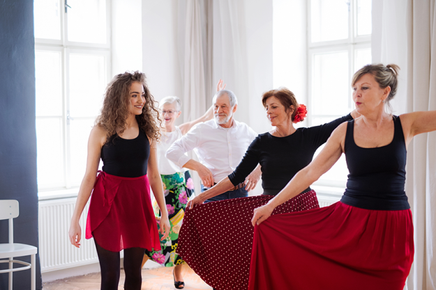 group of senior people in dancing class