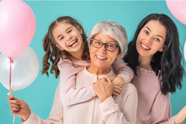 Happy women day child daughter congratulating mom grandma giving them Happy women day child daughter congratulating mom grandma giving them