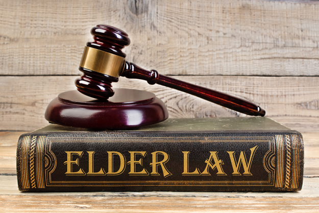 law concept open law book wooden judges gavel