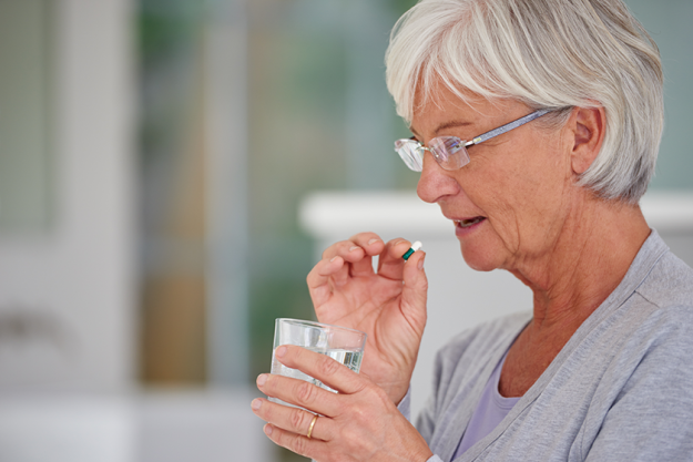 medication health woman drinking pill