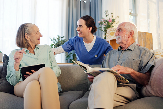 senior couple caregiver happy couch