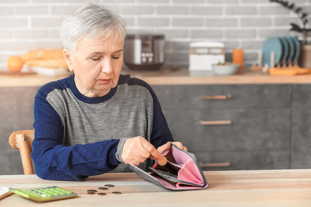 senior woman counting money