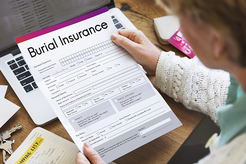 senior woman with application paper