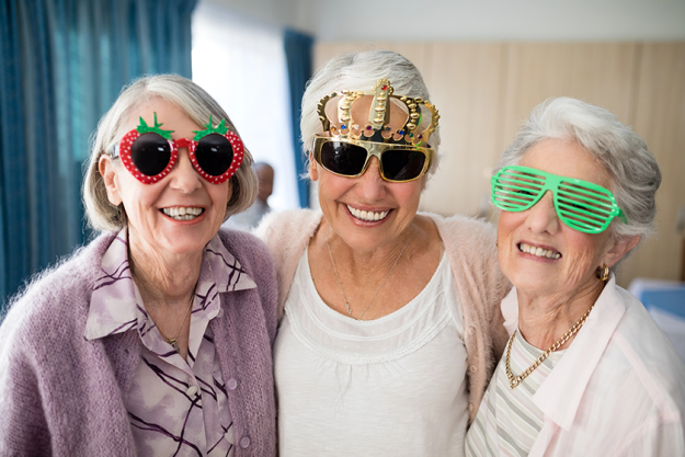senior women wearing novelty glasses senior women wearing novelty glasses