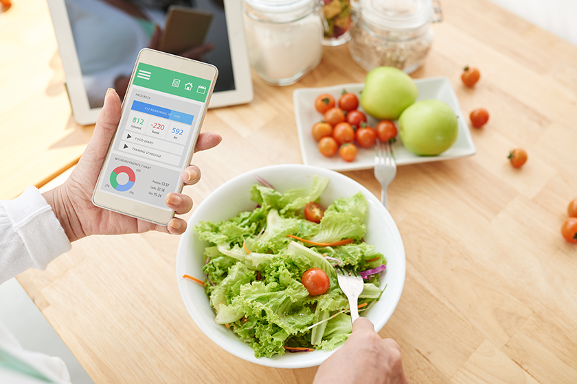woman checking nutrition information and calories