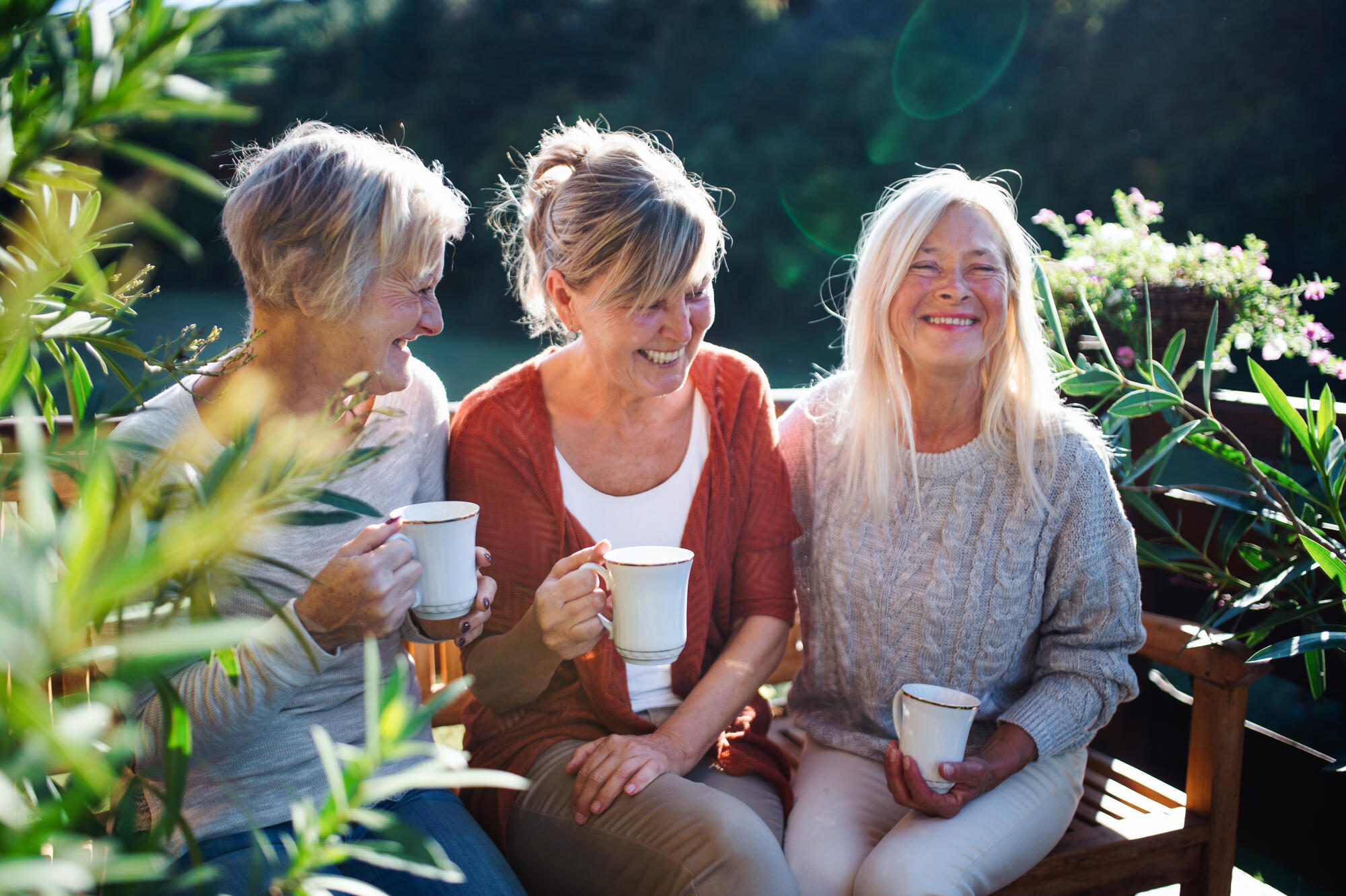Senior,Women,Friends,With,Coffee,Sitting,Outdoors,On,Terrace,,Resting.