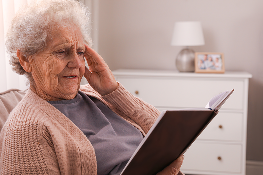 senior woman notebook home age related memory impairment senior woman notebook home age related memory impairment