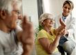 Happy,Senior,Woman,And,Her,Husband,Doing,Stretching,Exercises,With