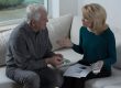 Old,Couple,Sitting,On,A,Sofa,And,Talking,About,Money