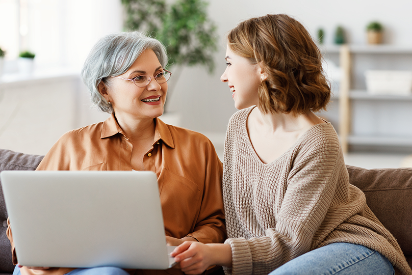happy aged woman young adult daughter smiling happy aged woman young adult daughter smiling