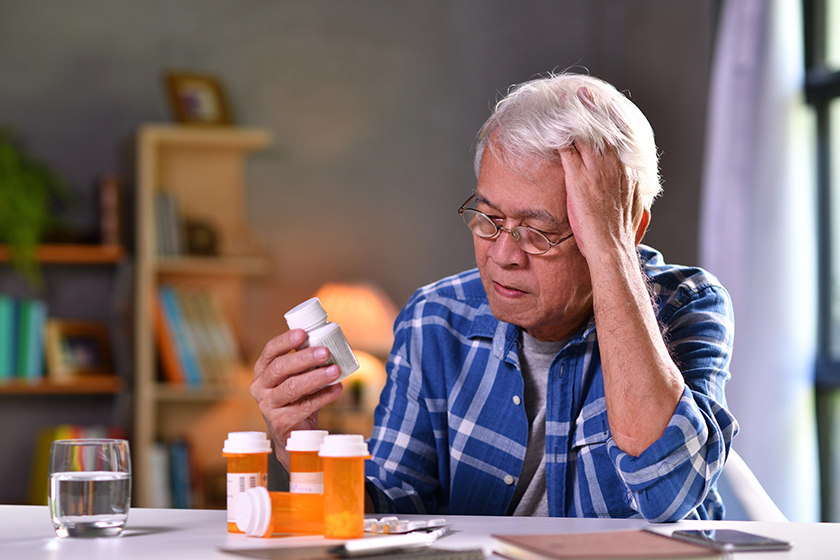 asian senior man his medicine bottles asian senior man his medicine bottles
