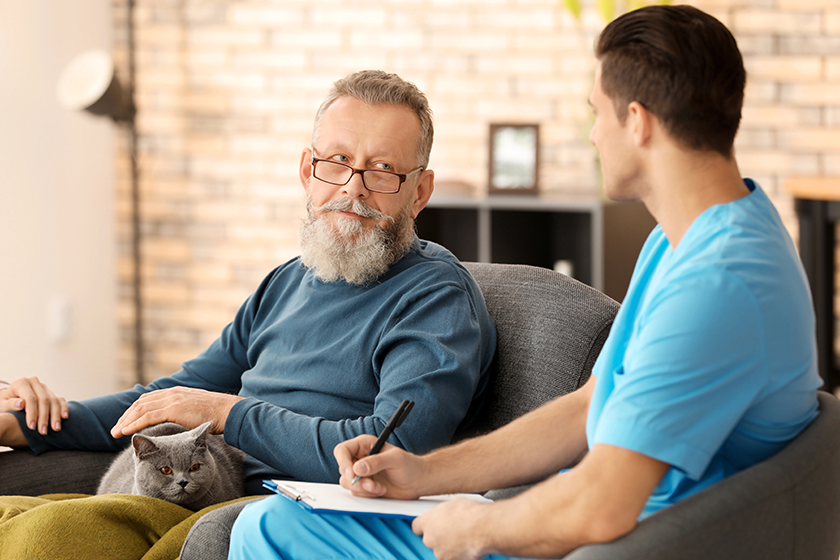 caregiver with senior man