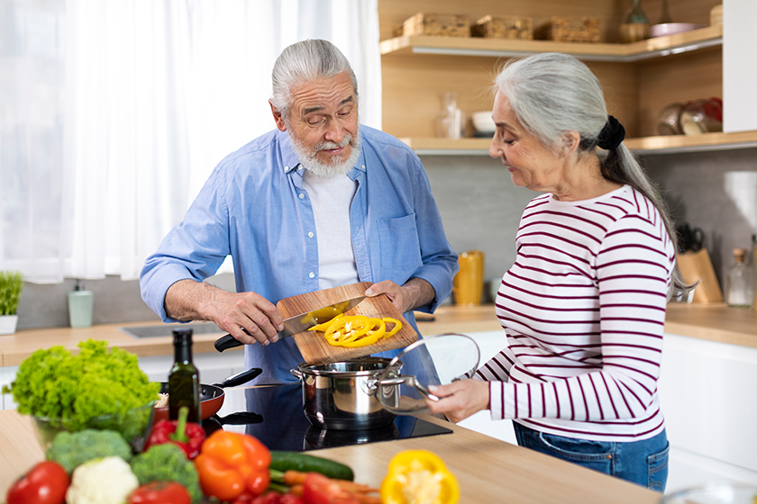 healthy eating seniors portrait elderly spouses cooking together healthy eating seniors portrait elderly spouses cooking together
