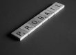 photo of scrabble toy on gray