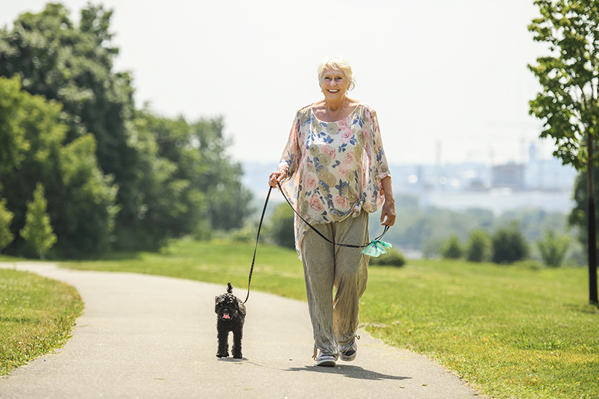 senior woman pet dog nature