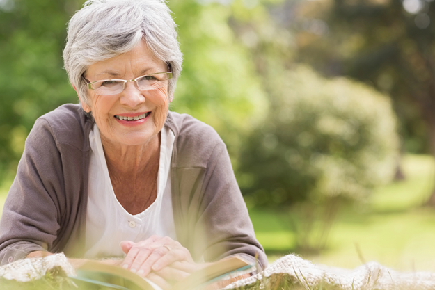 senior woman reading a book