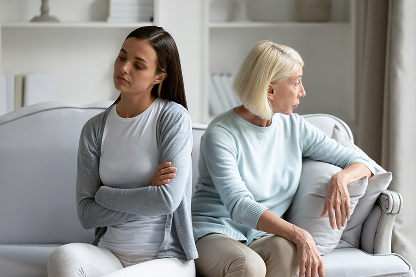 stubborn adult daughter and senior mom avoid talking after fight