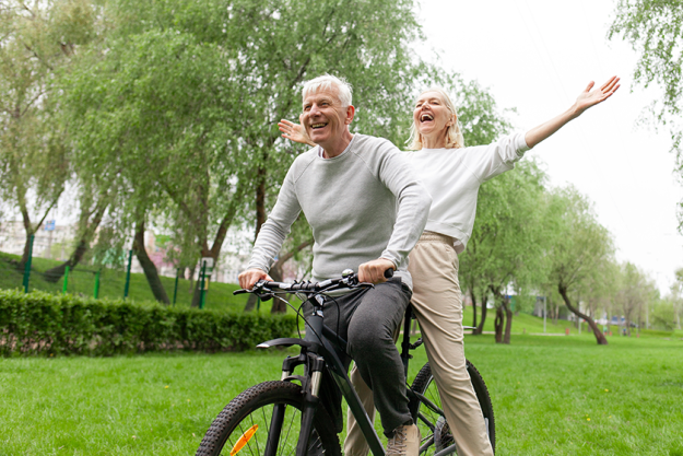 elderly senior couple riding bicycle elderly senior couple riding bicycle