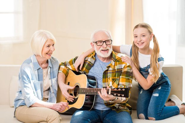 Happy family with guitar Happy family with guitar