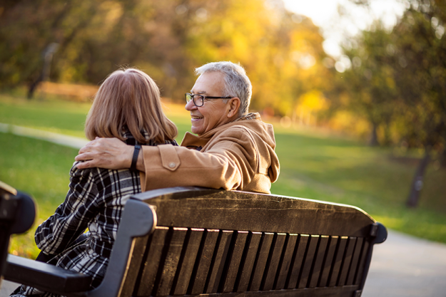 romantic senior couple sitting bench romantic senior couple sitting bench