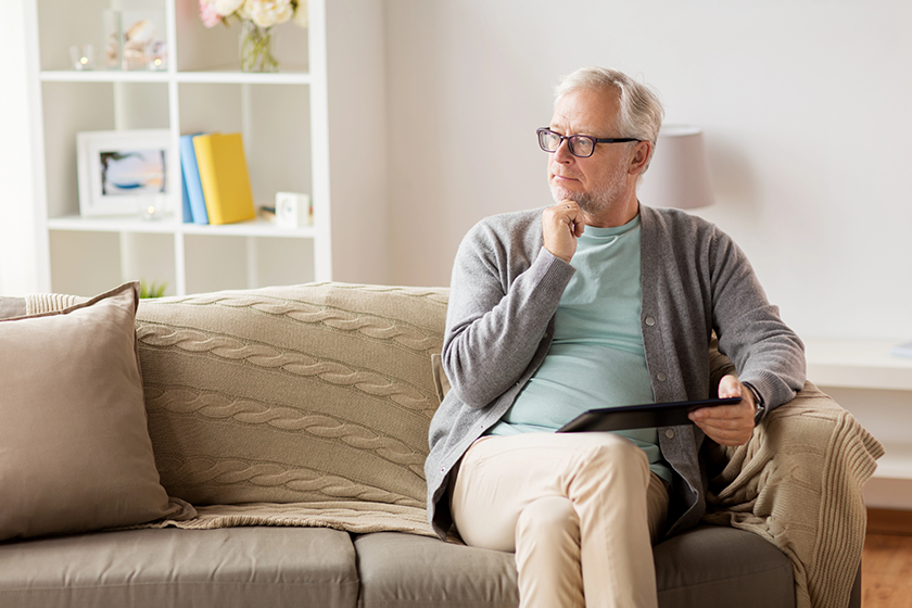 senior man with tablet