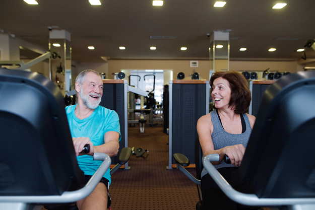 beautiful fit senior couple in gym beautiful fit senior couple in gym