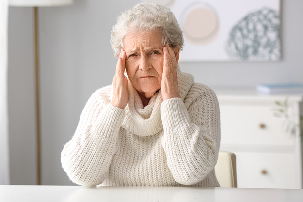 elderly woman video chatting doctor