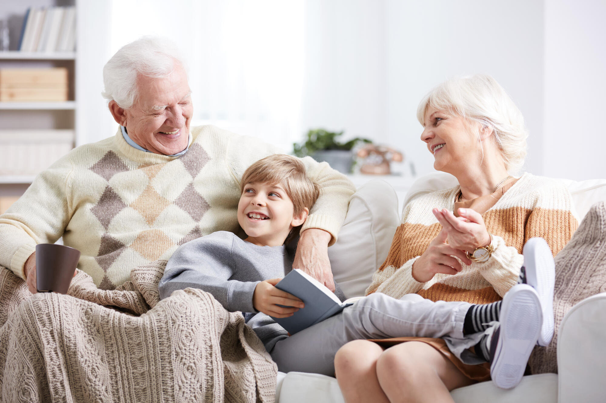 Boy,Relaxing,Together,With,His,Grandfather,And,Grandmother Boy,Relaxing,Together,With,His,Grandfather,And,Grandmother