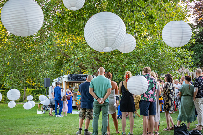 people hanging out ordering food and drinks in a local park people hanging out ordering food and drinks in a local park