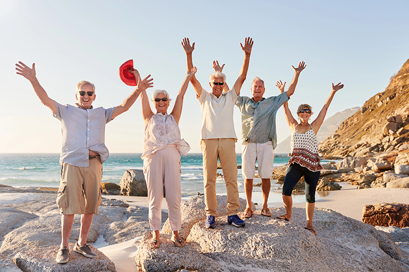 portrait senior friends standing rocks