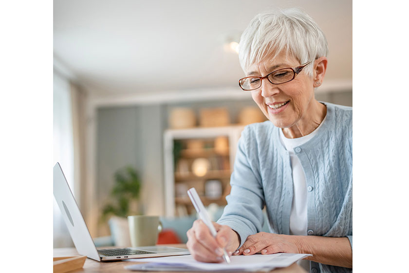 Senior caucasian woman use laptop computer home work Senior caucasian woman use laptop computer home work