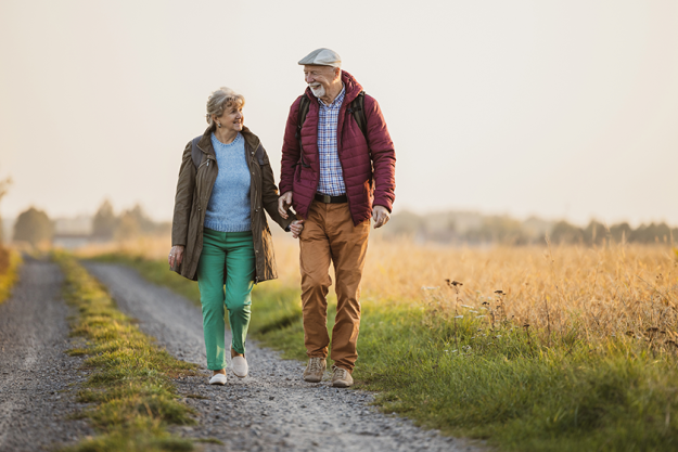 senior couple field autumn sunset
