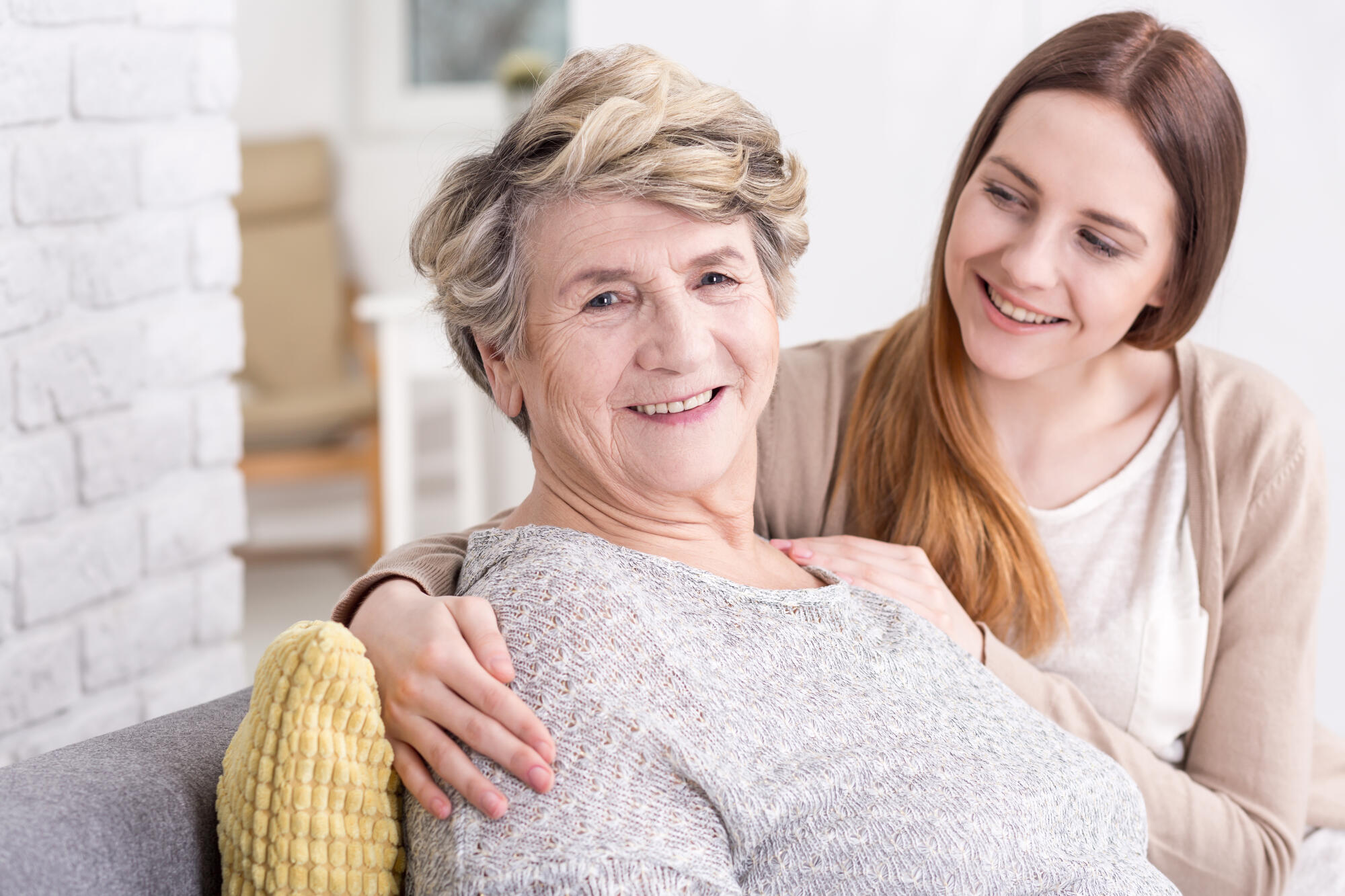 Shot,Of,A,Granddaughter,Hugging,Her,Grandma Shot,Of,A,Granddaughter,Hugging,Her,Grandma