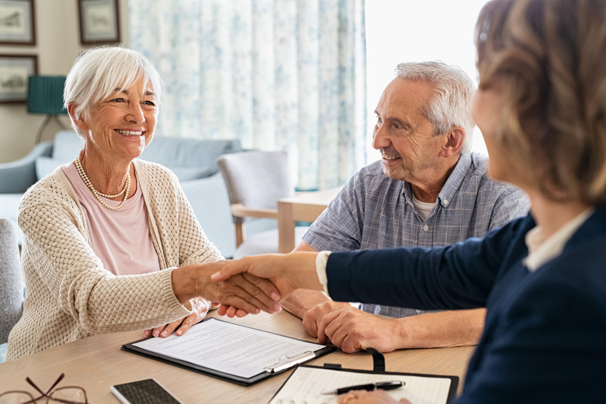 Happy,Old,Woman,Shaking,Hands,With,Medical,Adviser,For,Health Happy,Old,Woman,Shaking,Hands,With,Medical,Adviser,For,Health