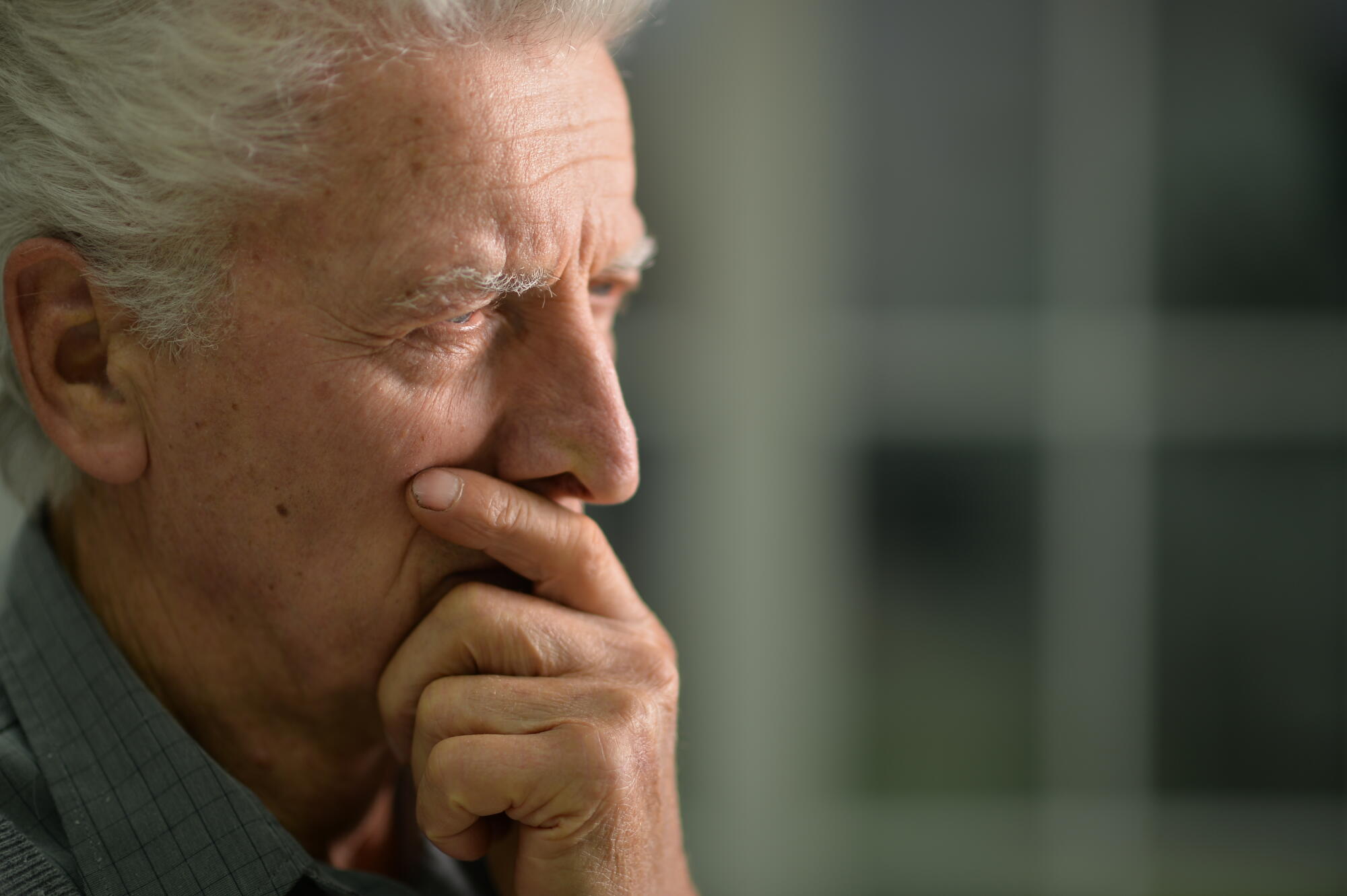 Portrait of a thoughtful senior man close up Portrait of a thoughtful senior man close up
