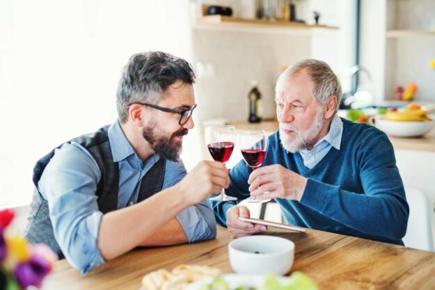 An,Adult,Hipster,Son,And,Senior,Father,Indoors,At,Home,