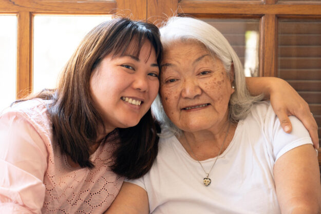 Portrait of asian senior mother and adult daughter