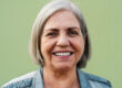 Happy senior woman smiling in front of camera Elderly people l